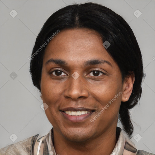 Joyful black young-adult female with short  black hair and brown eyes