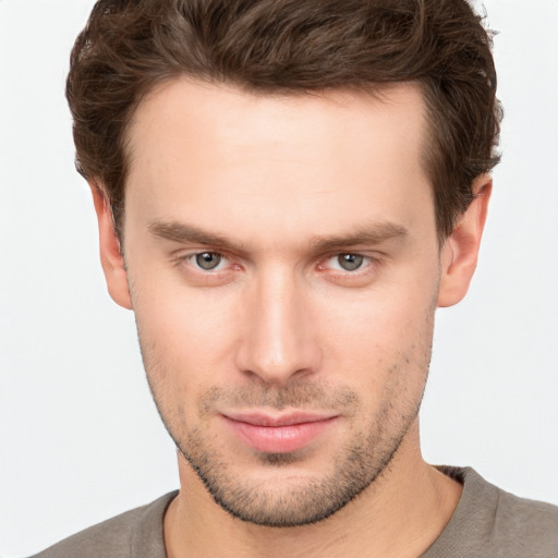 Neutral white young-adult male with short  brown hair and brown eyes