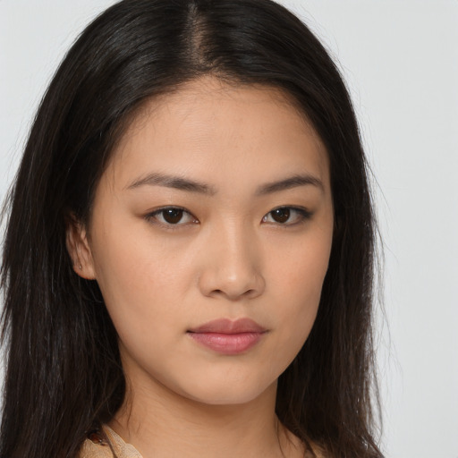 Neutral asian young-adult female with long  brown hair and brown eyes