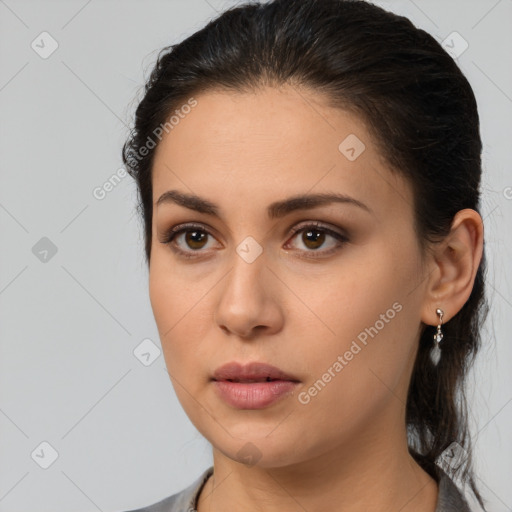 Neutral white young-adult female with medium  brown hair and brown eyes