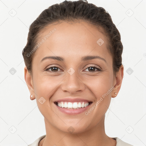 Joyful white young-adult female with short  brown hair and brown eyes