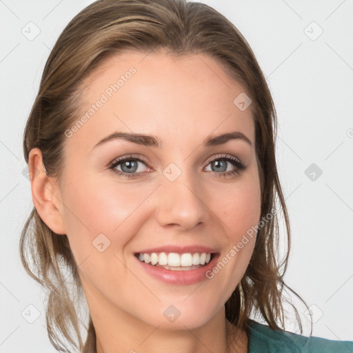 Joyful white young-adult female with medium  brown hair and blue eyes