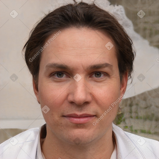 Joyful white adult female with short  brown hair and brown eyes