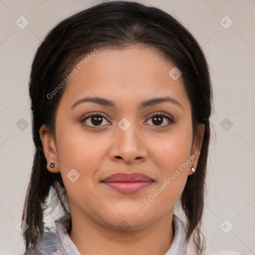 Joyful latino young-adult female with medium  brown hair and brown eyes