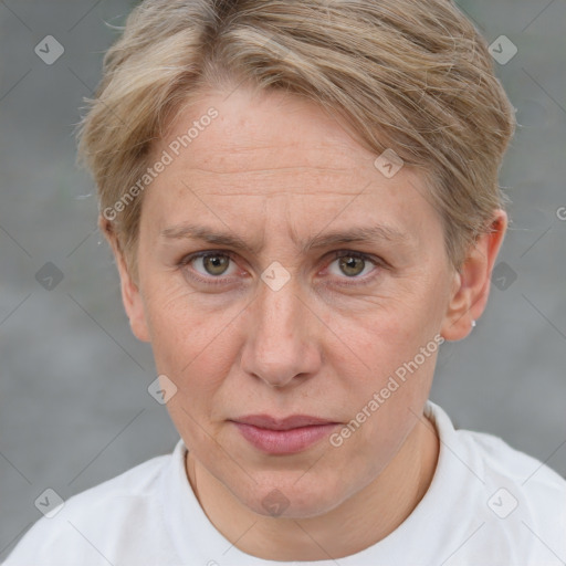 Joyful white adult female with short  brown hair and grey eyes