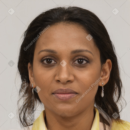 Joyful black young-adult female with medium  brown hair and brown eyes