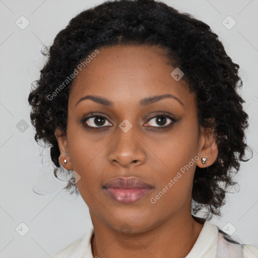 Neutral black young-adult female with medium  brown hair and brown eyes