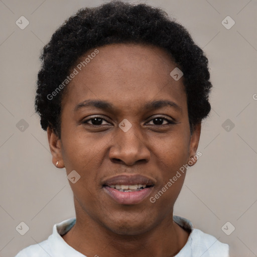 Joyful black young-adult female with short  black hair and brown eyes