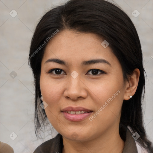 Joyful asian young-adult female with medium  brown hair and brown eyes