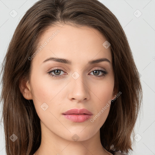 Neutral white young-adult female with long  brown hair and brown eyes