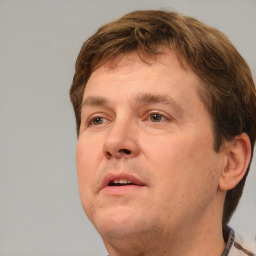 Neutral white adult male with short  brown hair and brown eyes