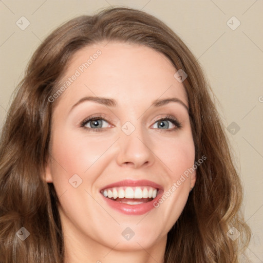 Joyful white young-adult female with long  brown hair and green eyes