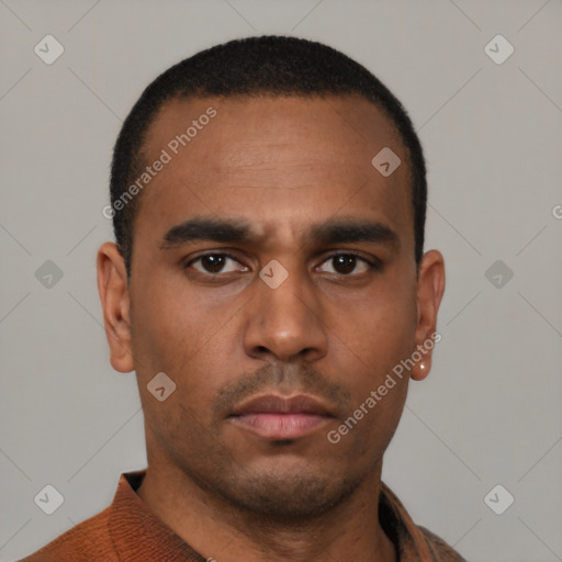 Neutral latino young-adult male with short  black hair and brown eyes