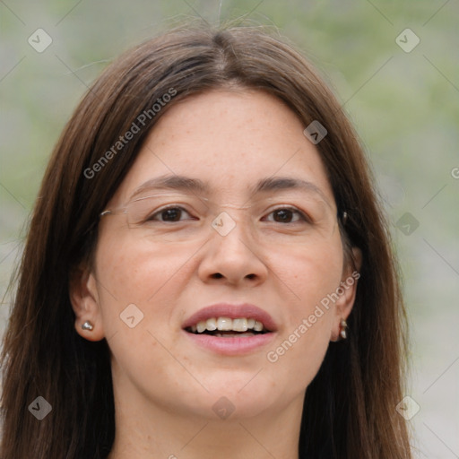 Joyful white adult female with long  brown hair and brown eyes