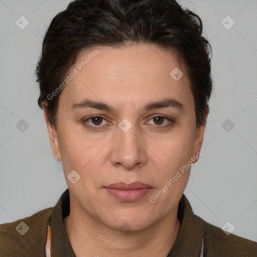 Joyful white adult female with short  brown hair and brown eyes