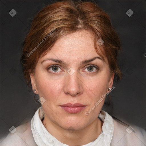 Joyful white adult female with medium  brown hair and blue eyes