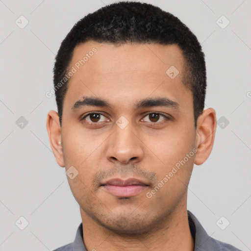 Neutral latino young-adult male with short  black hair and brown eyes