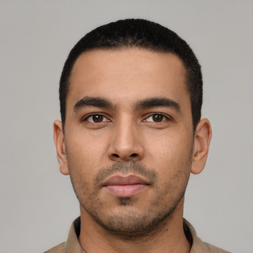 Neutral latino young-adult male with short  black hair and brown eyes