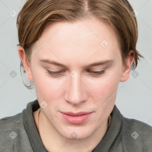 Joyful white young-adult female with long  brown hair and blue eyes