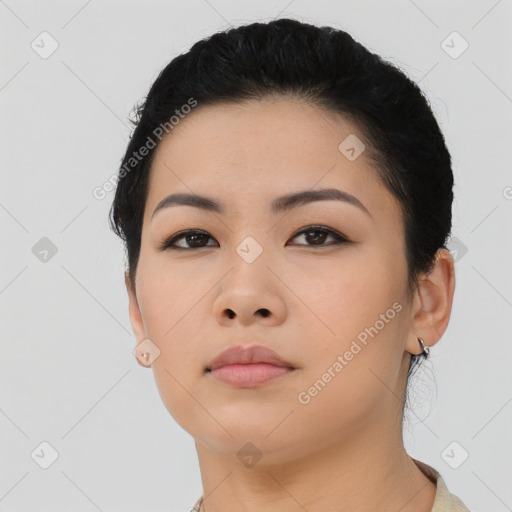 Neutral asian young-adult female with short  black hair and brown eyes