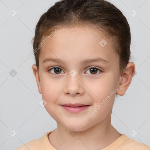 Joyful white child female with short  brown hair and brown eyes