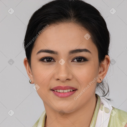 Joyful latino young-adult female with medium  brown hair and brown eyes