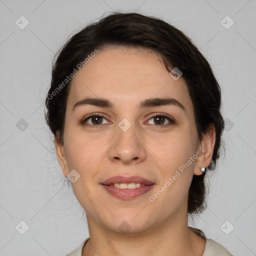 Joyful white young-adult female with medium  brown hair and brown eyes