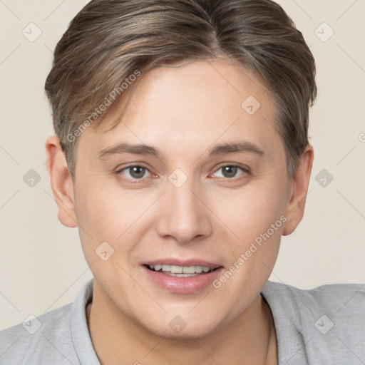 Joyful white young-adult female with short  brown hair and brown eyes