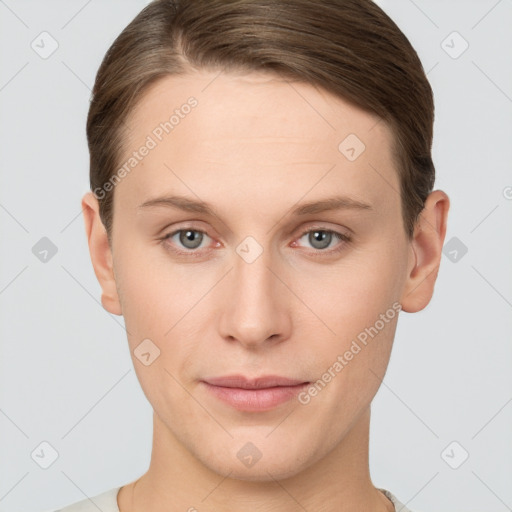 Joyful white young-adult female with short  brown hair and grey eyes