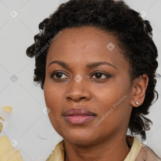 Joyful black young-adult female with medium  black hair and brown eyes