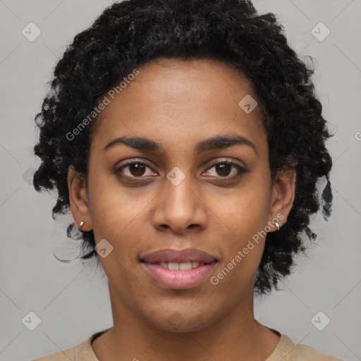 Joyful black young-adult female with short  black hair and brown eyes