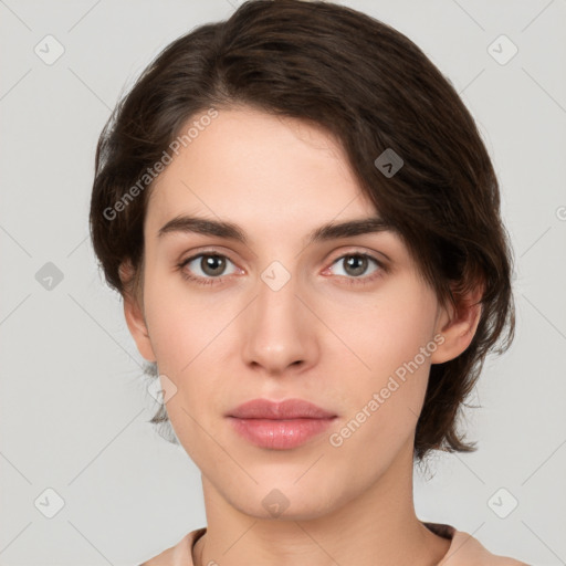 Neutral white young-adult female with medium  brown hair and brown eyes