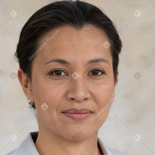 Joyful white adult female with medium  brown hair and brown eyes