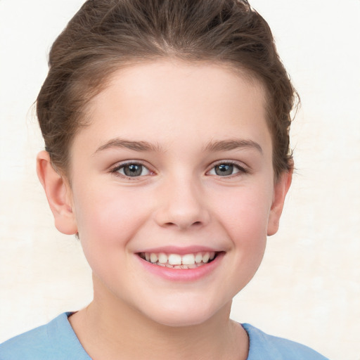 Joyful white child female with short  brown hair and brown eyes