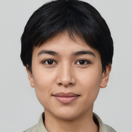 Joyful white young-adult female with short  black hair and brown eyes