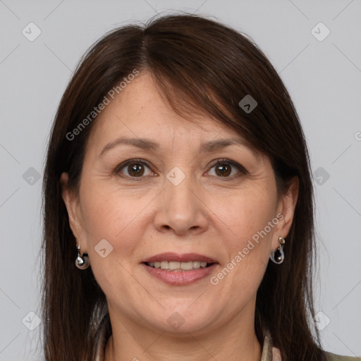 Joyful white adult female with medium  brown hair and brown eyes