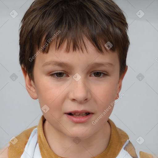 Joyful white child male with short  brown hair and brown eyes