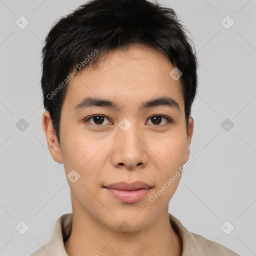 Joyful asian young-adult male with short  brown hair and brown eyes