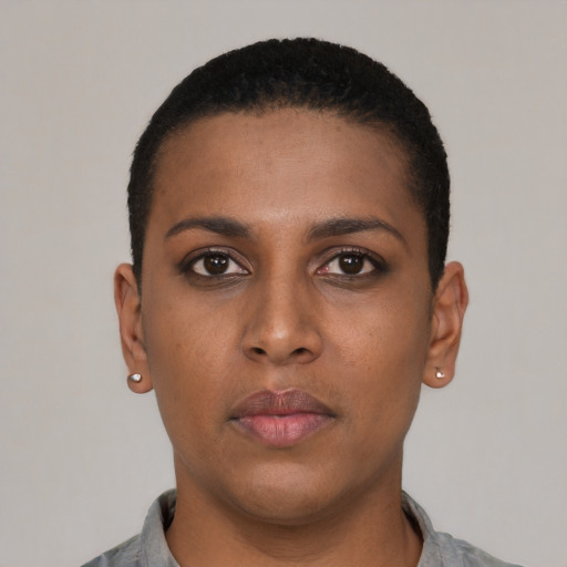 Neutral black young-adult female with short  black hair and brown eyes
