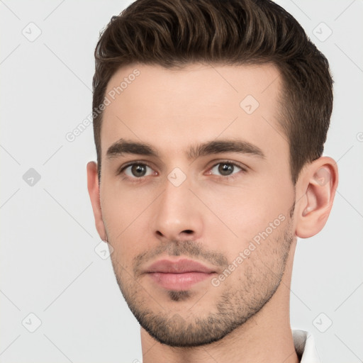 Neutral white young-adult male with short  brown hair and brown eyes