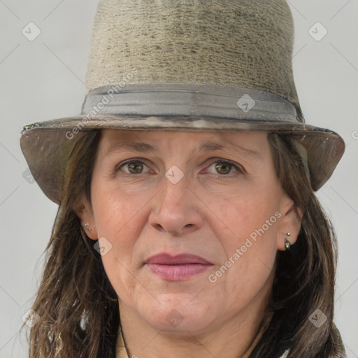 Joyful white adult female with medium  brown hair and grey eyes