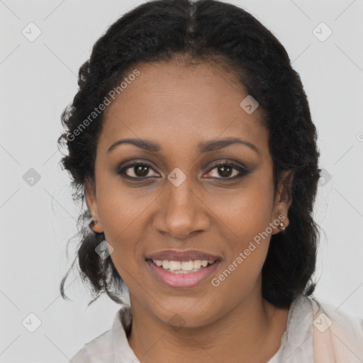 Joyful black young-adult female with long  brown hair and brown eyes