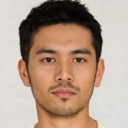 Neutral asian young-adult male with short  brown hair and brown eyes