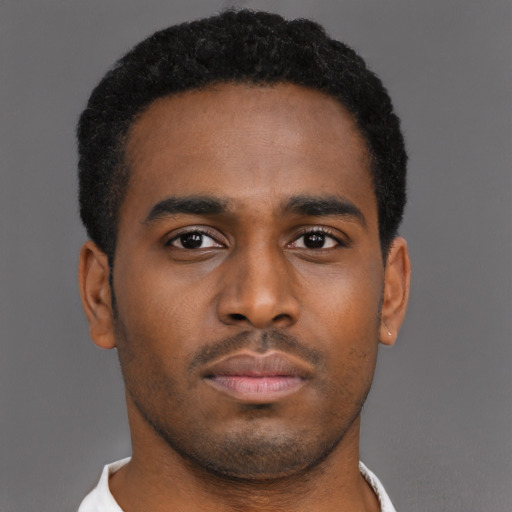 Neutral latino young-adult male with short  brown hair and brown eyes