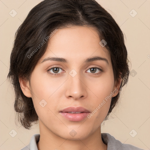 Neutral white young-adult female with medium  brown hair and brown eyes