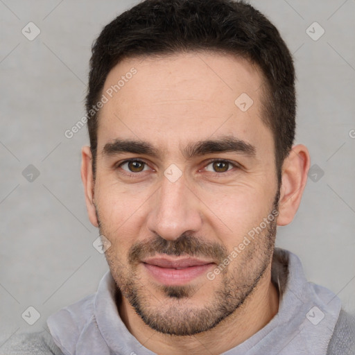 Joyful white young-adult male with short  brown hair and brown eyes