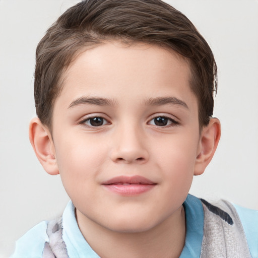 Joyful white child male with short  brown hair and brown eyes