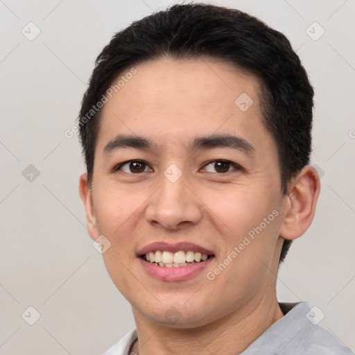 Joyful white young-adult male with short  black hair and brown eyes