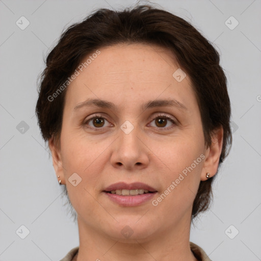 Joyful white adult female with short  brown hair and brown eyes