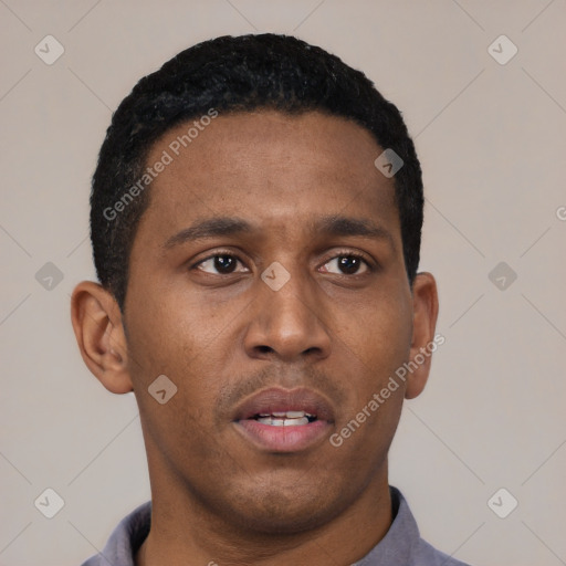 Neutral latino young-adult male with short  black hair and brown eyes